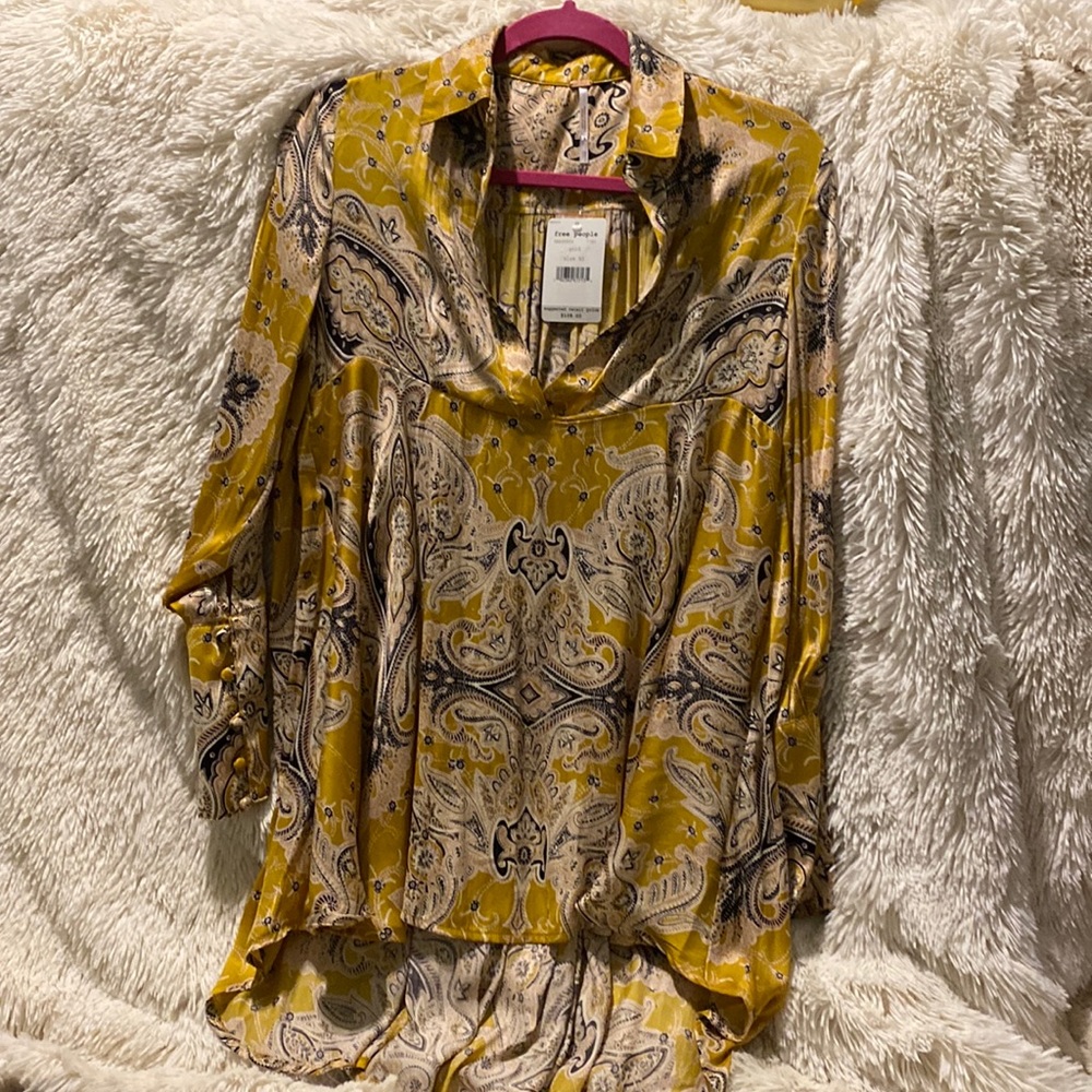 Free people silky tunic.  Never worn!  Excellent condition!